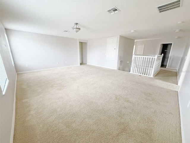 1208 Sawgrass Pointe Dr, Orlando, FL 32824 - empty room with visible vents, baseboards, and carpet floors