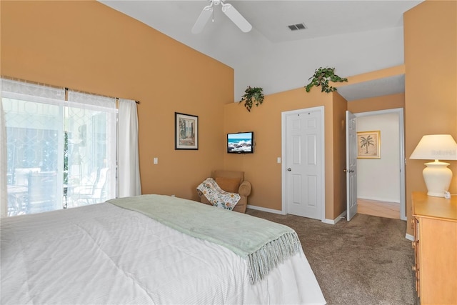 bedroom with carpet floors, vaulted ceiling, and ceiling fan