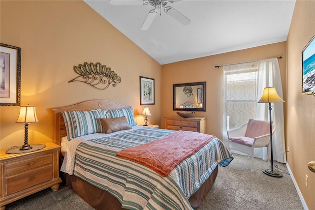 carpeted bedroom featuring ceiling fan and lofted ceiling