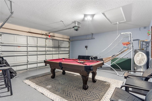 rec room with a textured ceiling and pool table