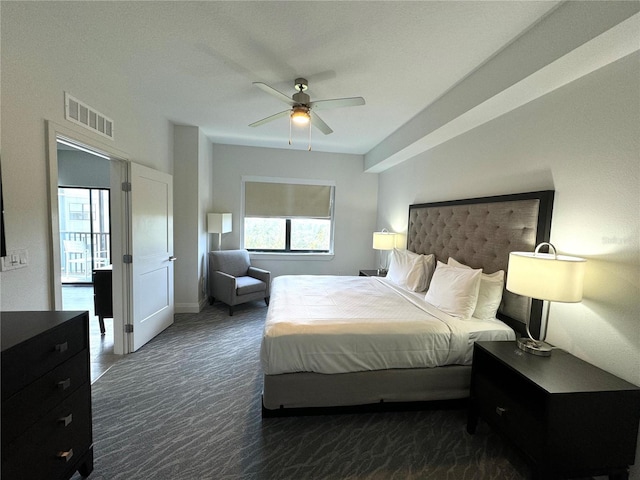 carpeted bedroom with ceiling fan