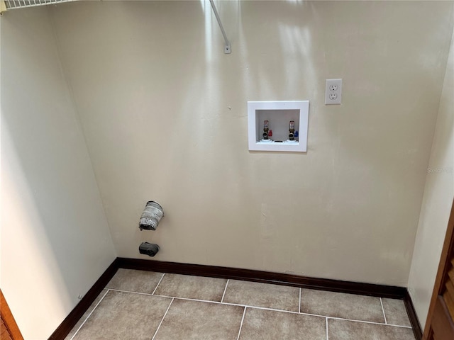 washroom featuring washer hookup, light tile patterned floors, and electric dryer hookup