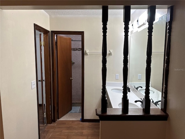 hallway featuring hardwood / wood-style floors