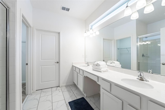 bathroom with vanity and walk in shower