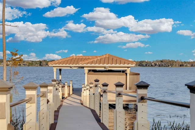 view of dock with a water view