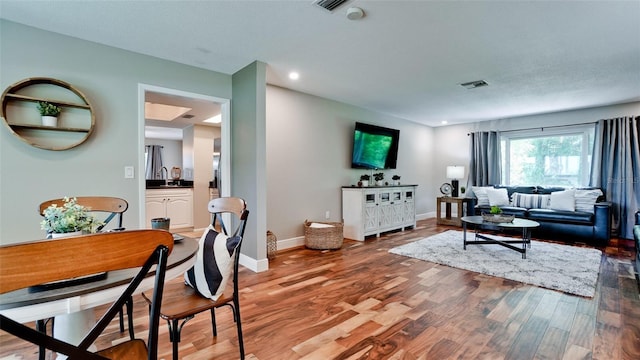 living room featuring hardwood / wood-style flooring