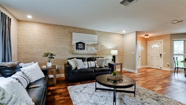 living room featuring dark hardwood / wood-style floors