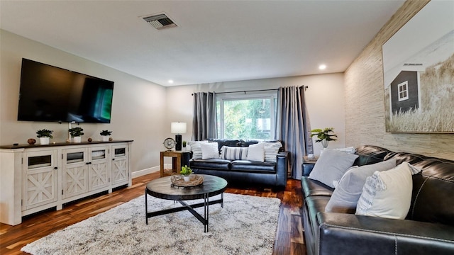 living room featuring dark hardwood / wood-style flooring