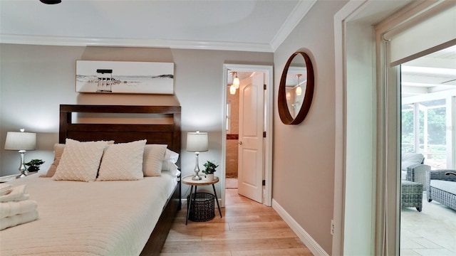 bedroom featuring light wood-type flooring and crown molding