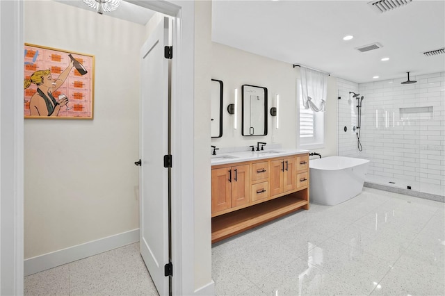 bathroom featuring vanity and plus walk in shower