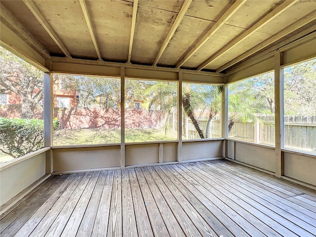 unfurnished sunroom with a healthy amount of sunlight