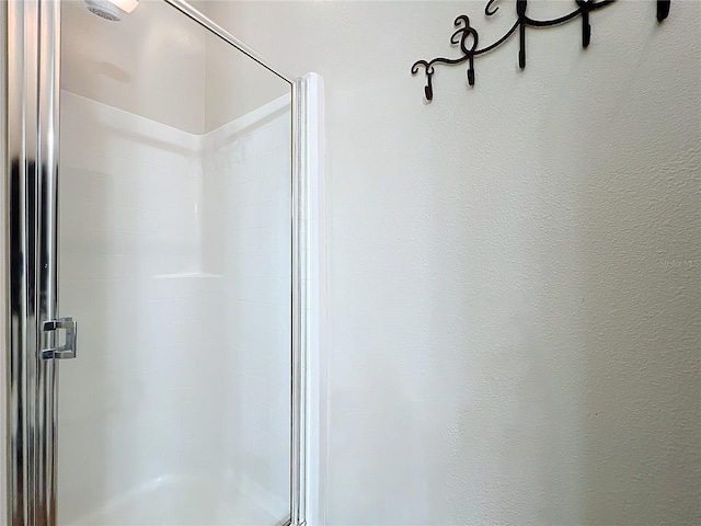 bathroom with an enclosed shower