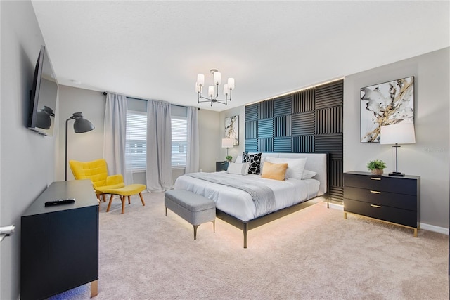 carpeted bedroom featuring a notable chandelier