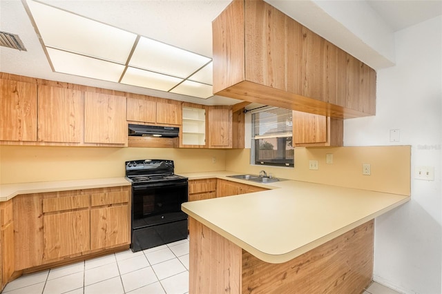 kitchen featuring sink, black range with electric cooktop, kitchen peninsula, a breakfast bar area, and light tile patterned flooring