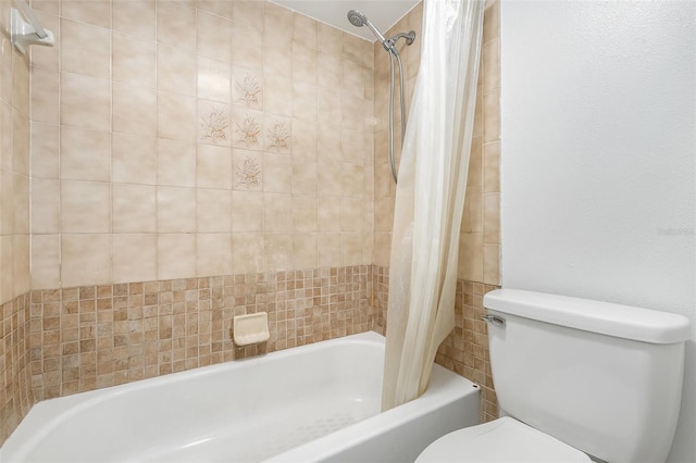 bathroom with toilet and shower / tub combo