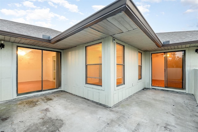 view of side of home featuring a patio