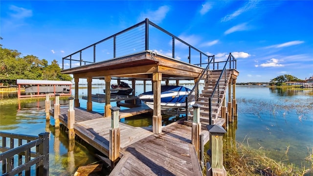 view of dock with a water view