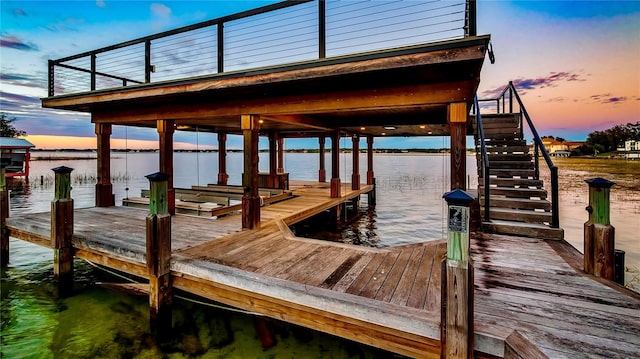 dock area with a water view