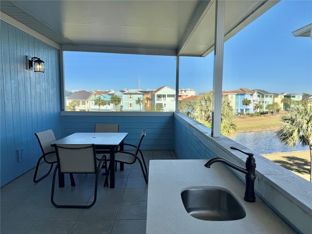 view of patio / terrace featuring a balcony and sink