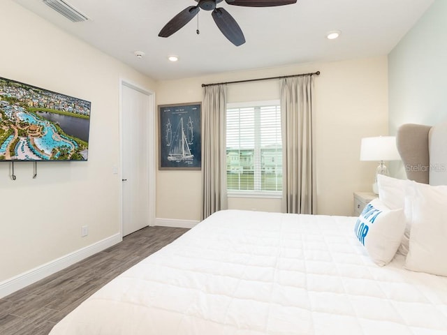 bedroom featuring hardwood / wood-style floors and ceiling fan