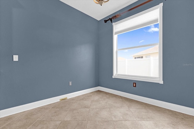 view of tiled spare room