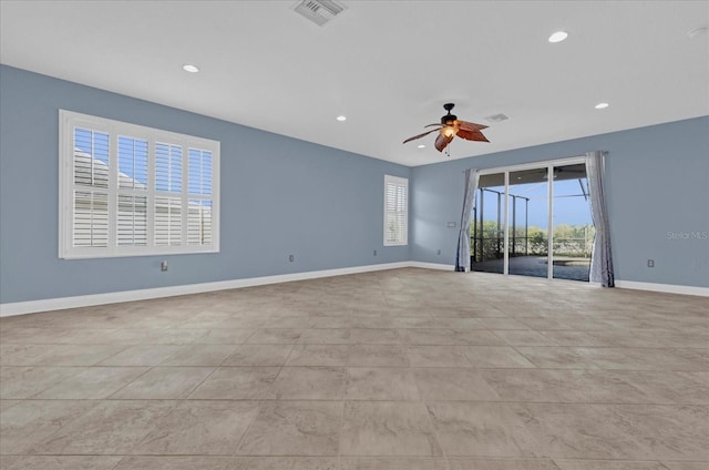 unfurnished room featuring ceiling fan