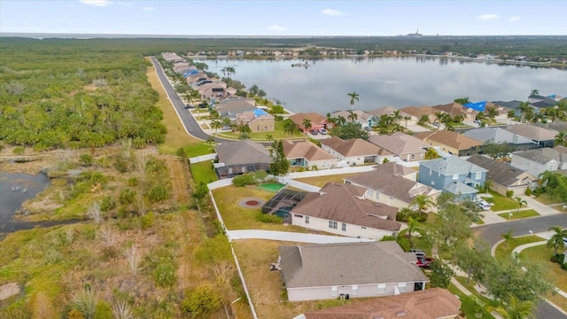 bird's eye view with a water view