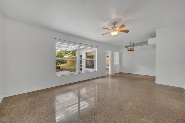 unfurnished room featuring ceiling fan