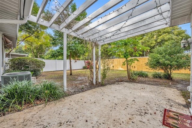 view of patio with cooling unit and a pergola