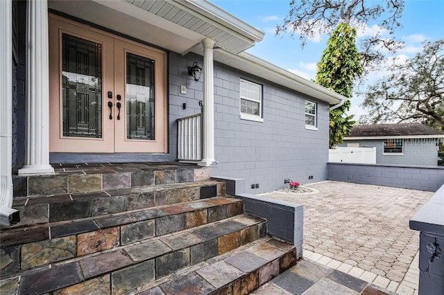 property entrance with french doors