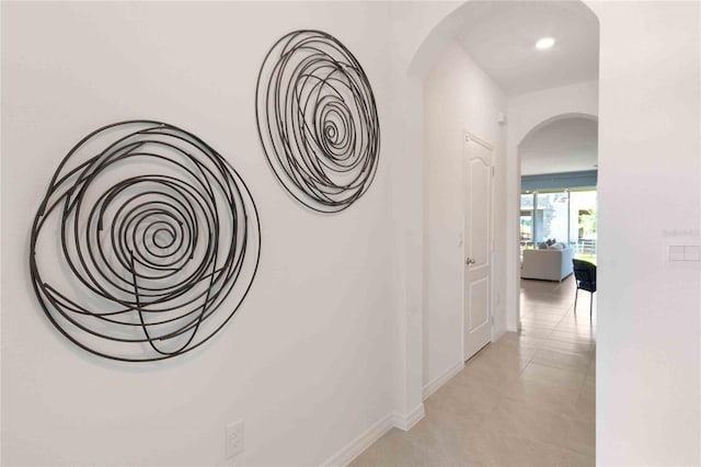 hallway with light tile patterned flooring