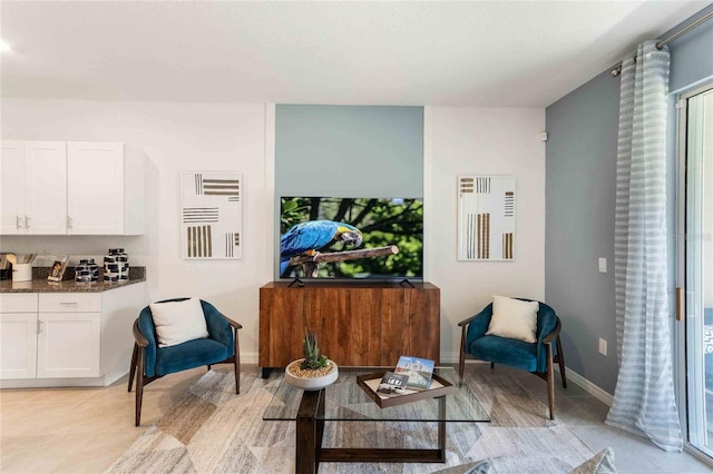 living room featuring light tile patterned floors