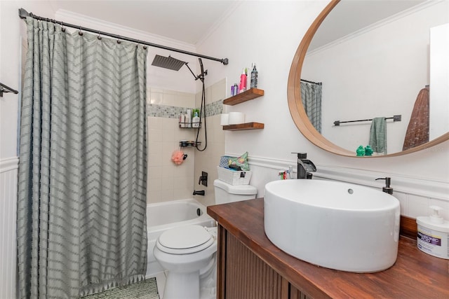 full bathroom featuring shower / bath combo, tile patterned floors, ornamental molding, vanity, and toilet