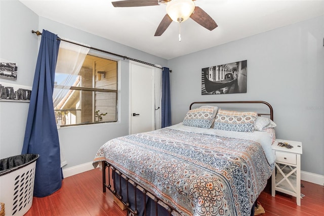 bedroom featuring wood-type flooring and ceiling fan