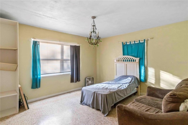 bedroom with a chandelier