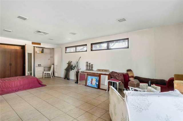2695 S E Ave, Sarasota, FL 34239 - bedroom with light tile patterned floors