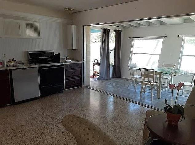 2695 S E Ave, Sarasota, FL 34239 - kitchen featuring range with electric stovetop, stainless steel dishwasher, light countertops, and speckle patterned floor