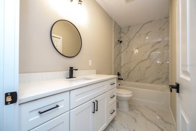 full bathroom with a textured ceiling, vanity, toilet, and tiled shower / bath