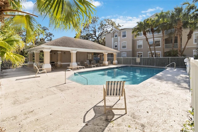 view of swimming pool featuring a patio area