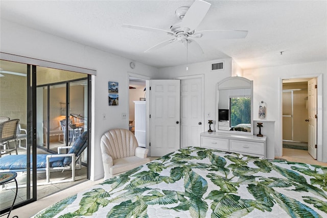 bedroom with a textured ceiling, access to outside, and ceiling fan