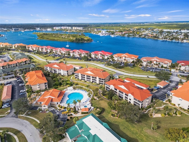 birds eye view of property featuring a water view