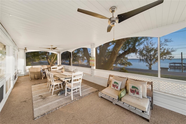 view of patio with a water view