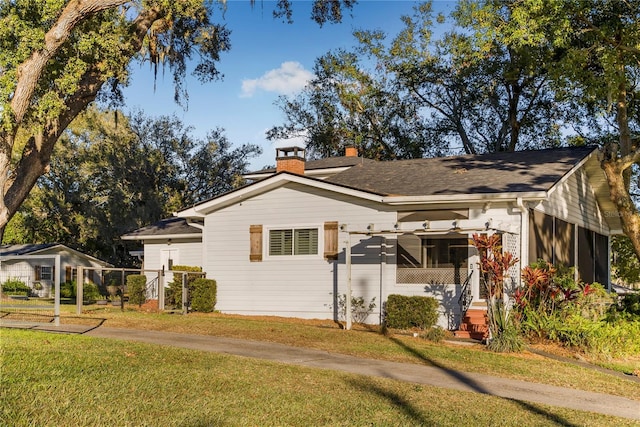 exterior space with a front lawn