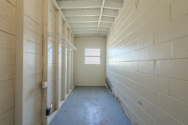 hallway featuring concrete flooring