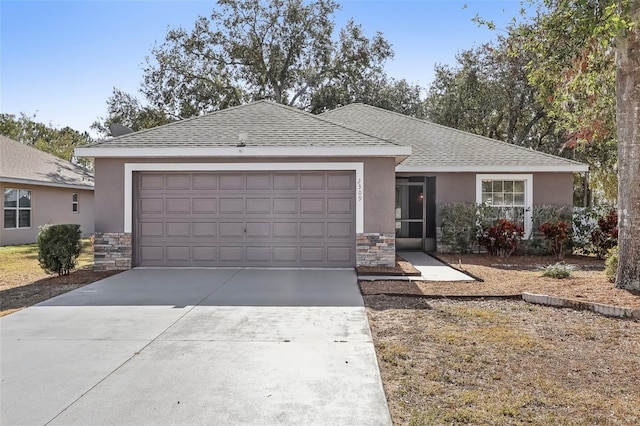 ranch-style home featuring a garage