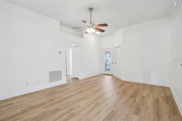 unfurnished room featuring ceiling fan and light hardwood / wood-style floors