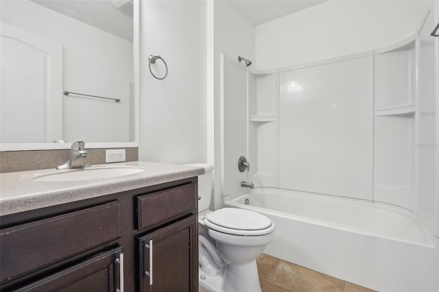 full bathroom with shower / tub combination, tile patterned flooring, vanity, and toilet