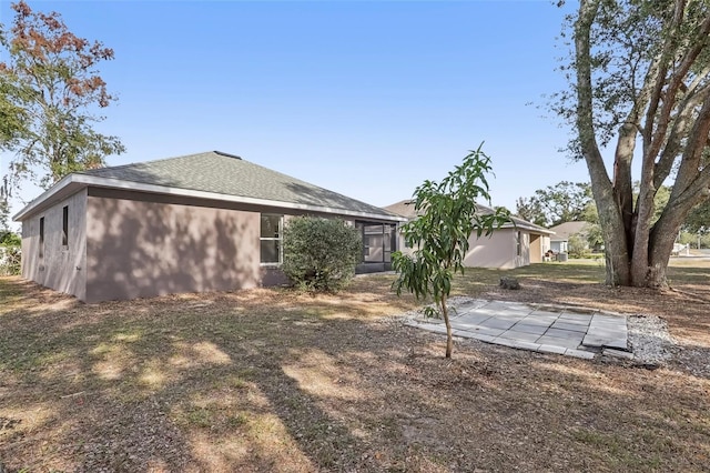 back of property with a patio area