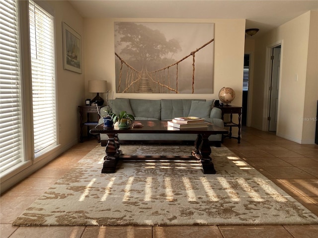 living area with light tile patterned floors and plenty of natural light