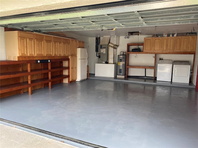 garage with independent washer and dryer, white refrigerator, electric water heater, and heating unit